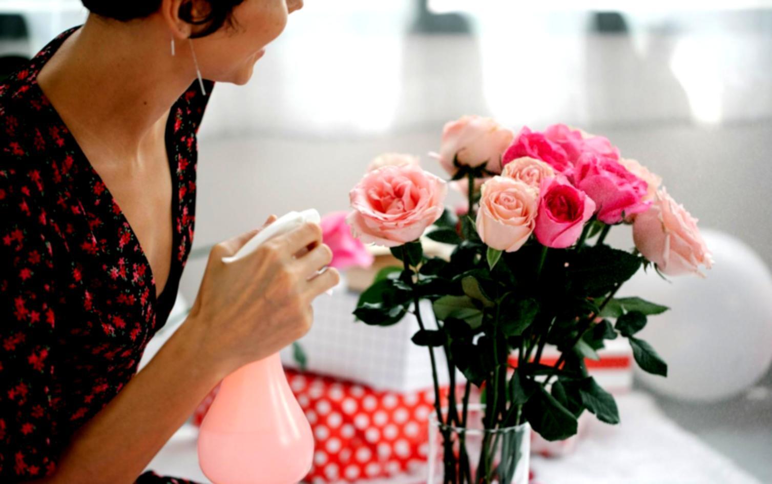 Floral design workspace with fresh flower arrangements